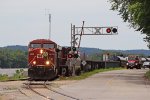CPKC K51, Dubuque-Marquette turn, hangs a left at the wye to cross Great River Rd. and enter the yard